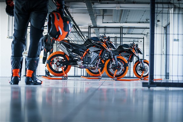 Two KTM 890 Duke Rs line up ready to race